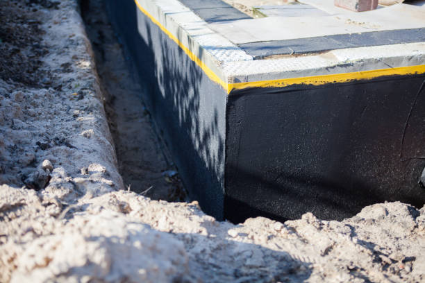 Professional Exterior Waterproofing technician working in Latham, NY